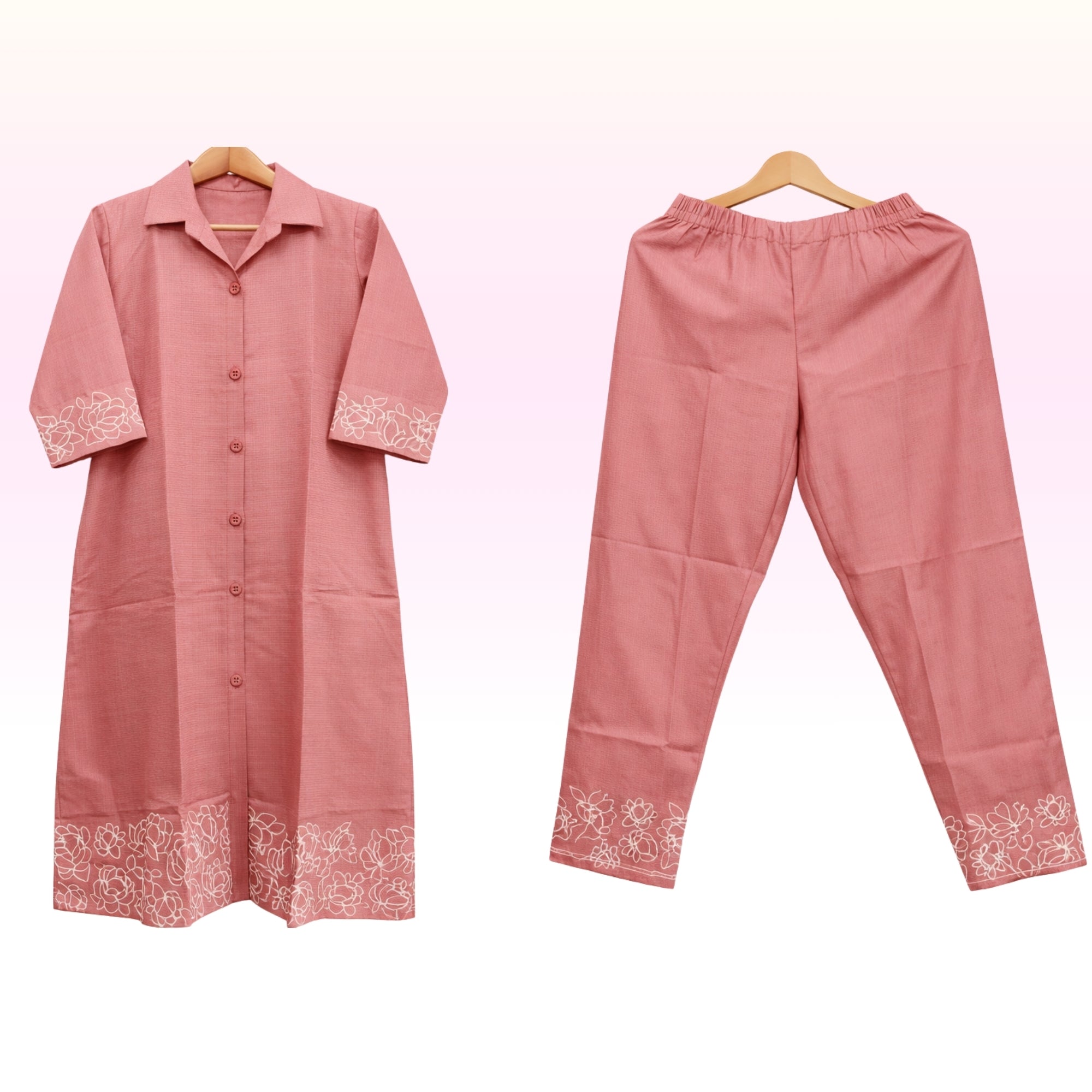 Women’s Solid Pink Cotton Kurta Pant Set with Embroidered Hem – Regular Wear