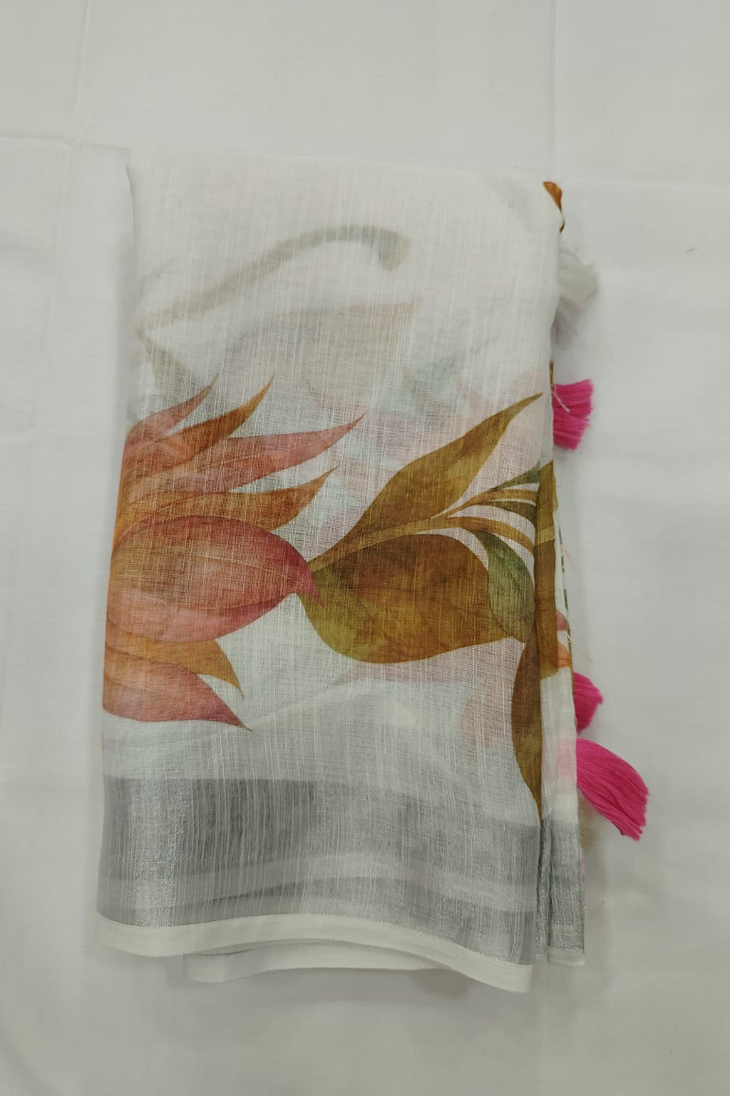 White Linen Cotton Saree with Floral Print & Pink Tassels