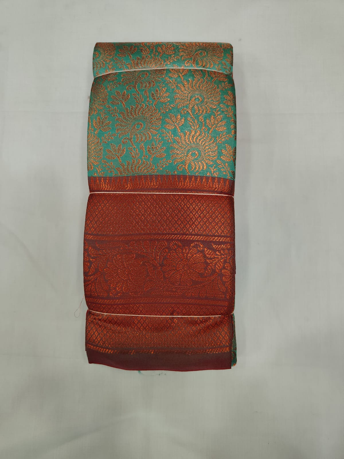 Rama Green Silk Saree with Floral Weaving & Rich Copper Zari Border