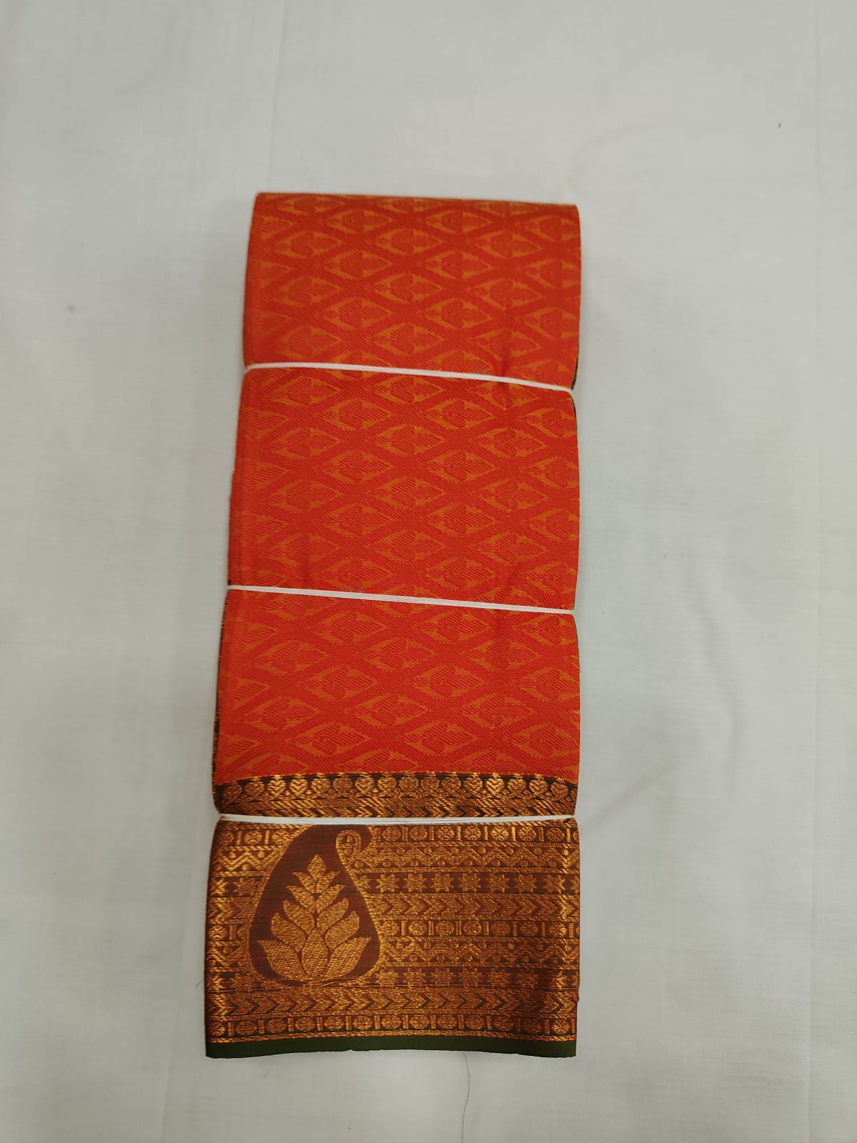 Orange Silk Saree with Geometric Pattern & Copper Zari Border