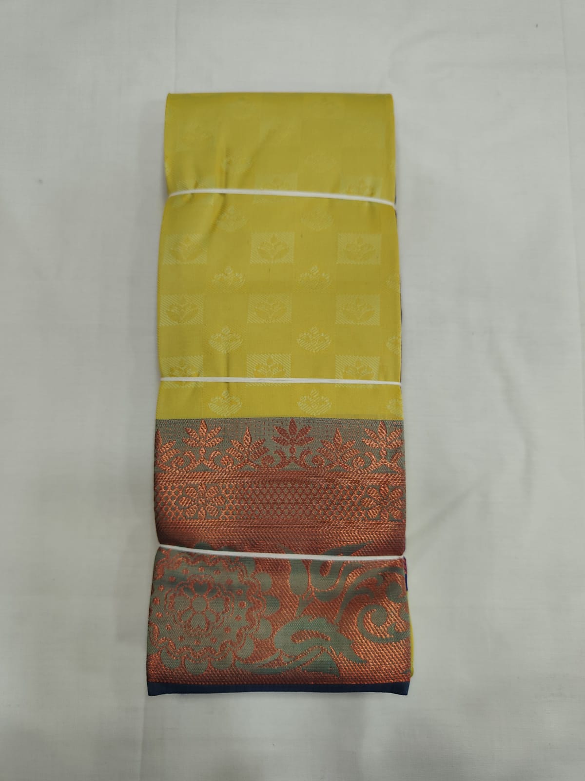 Light Yellow Silk Saree with Subtle Checks & Copper Zari Border