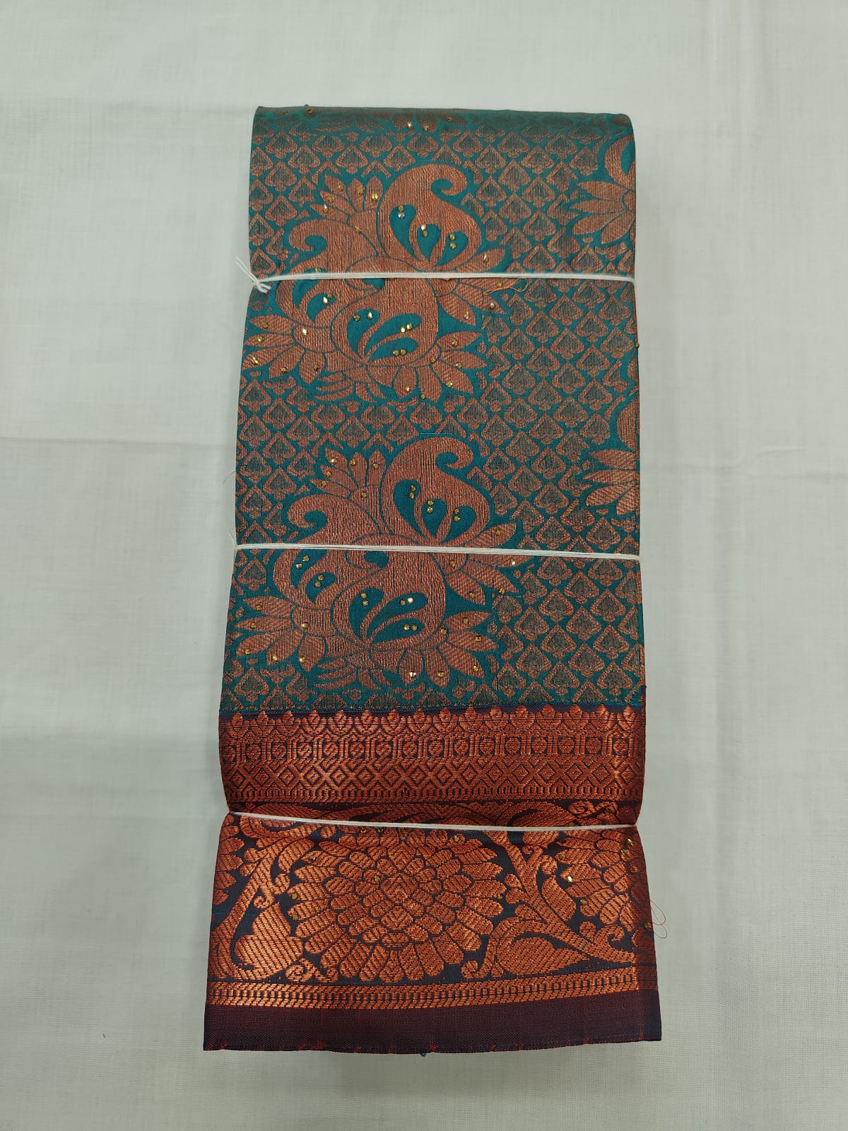 Teal Blue Silk Saree with Copper Zari Floral Motifs & Rich Border