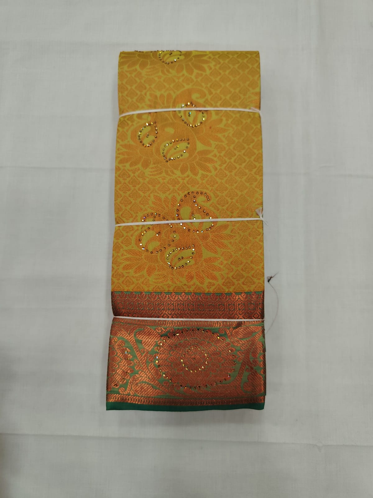 Light Green Silk Saree with Copper Zari Motifs & Rich Contrast Border