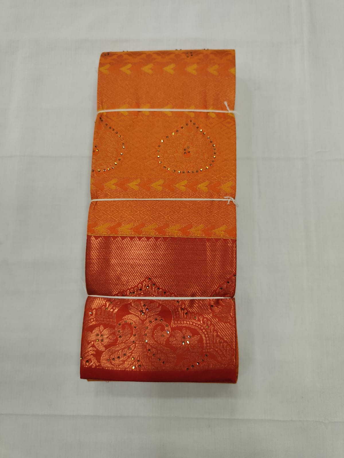 Bright Orange Silk Saree with Copper Zari Work & Traditional Border