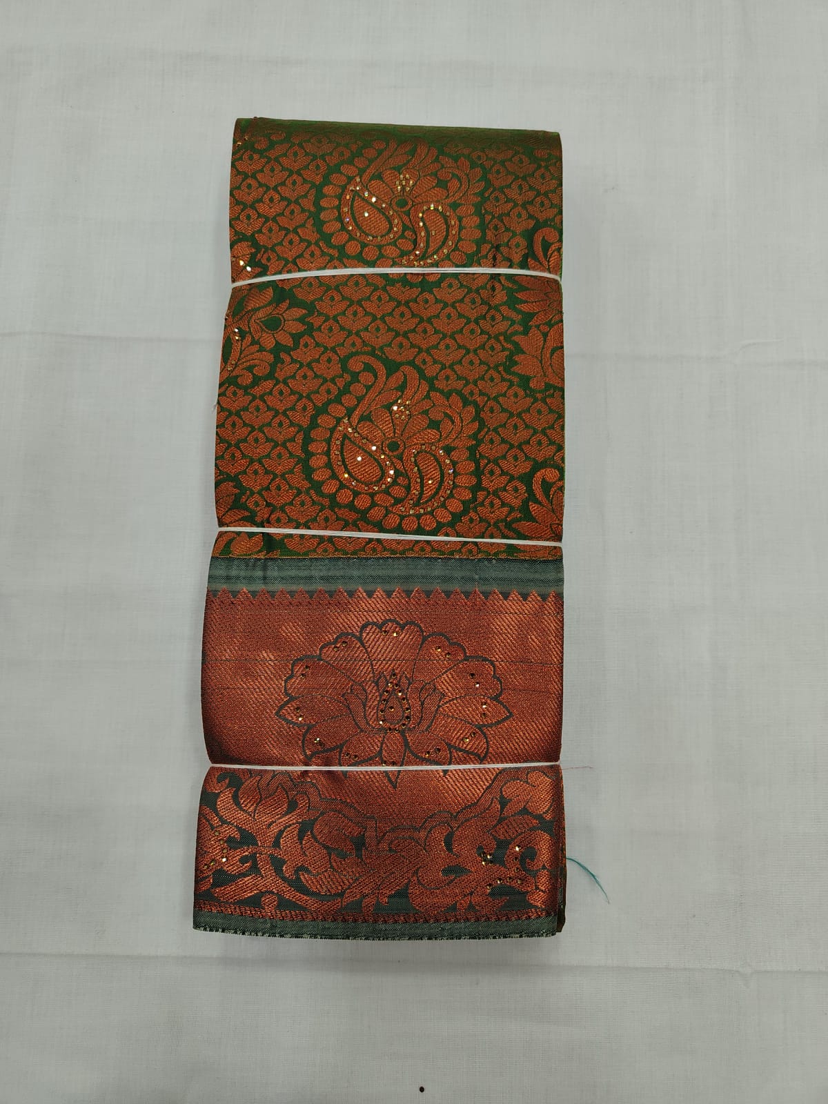 Elegant Green Silk Saree with Copper Zari Design