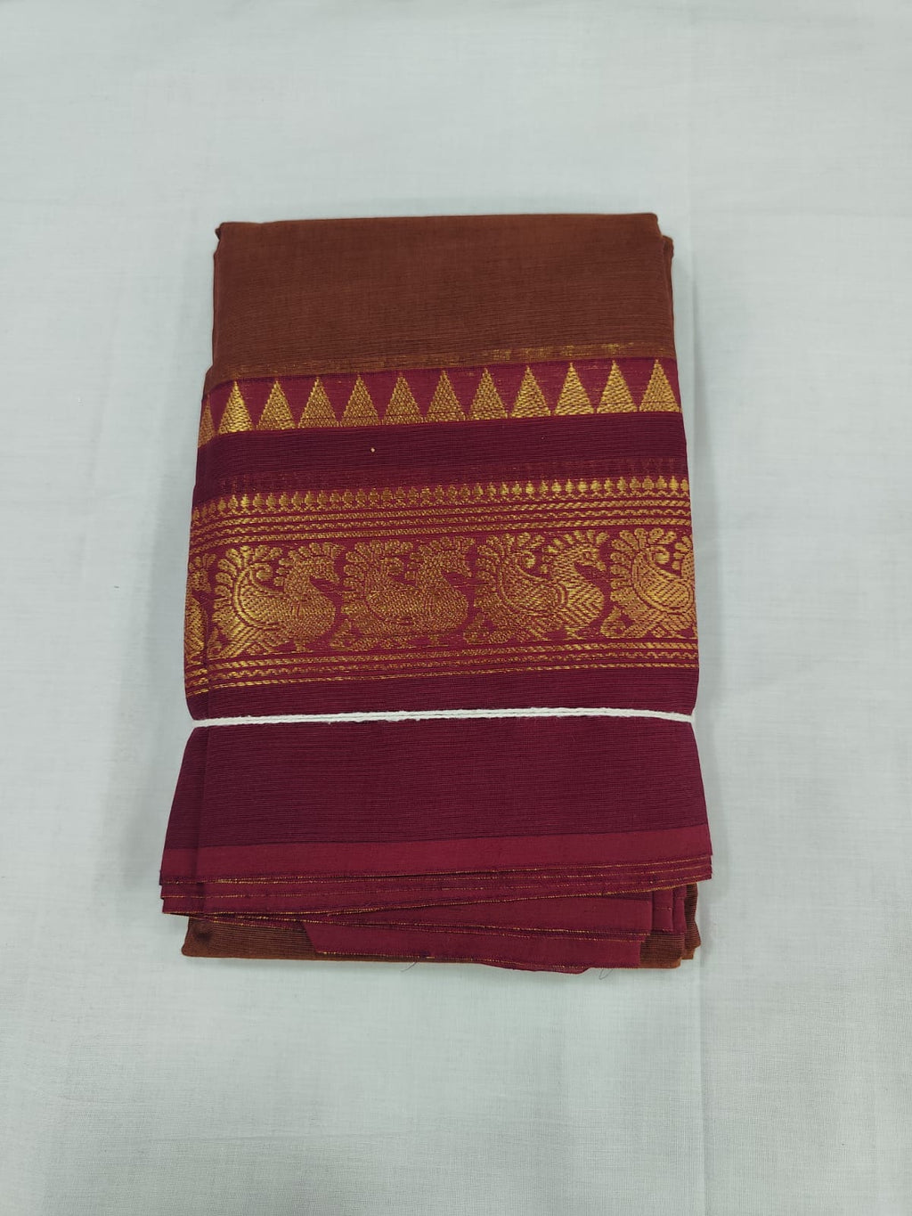 Rust Brown Cotton Saree with Maroon Zari Peacock Border – Traditional Chettinad Style