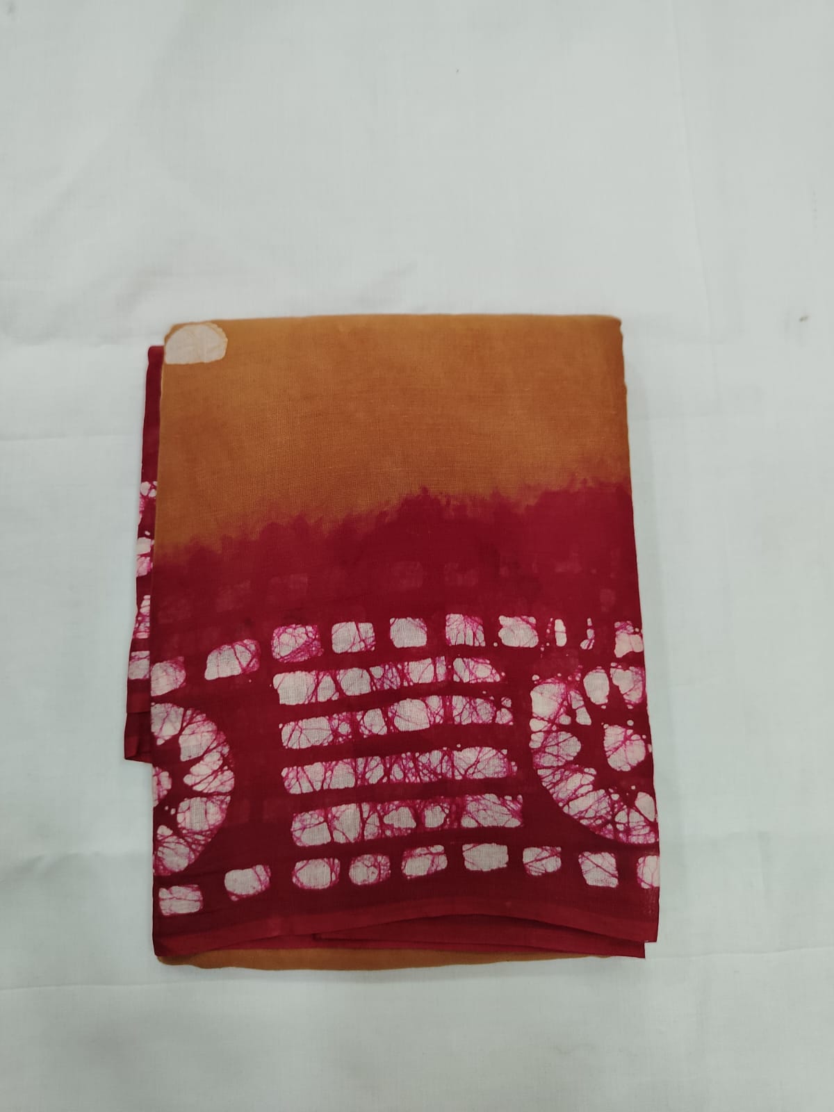 Mustard Orange Mulmul Cotton Saree with Red Batik Print Border