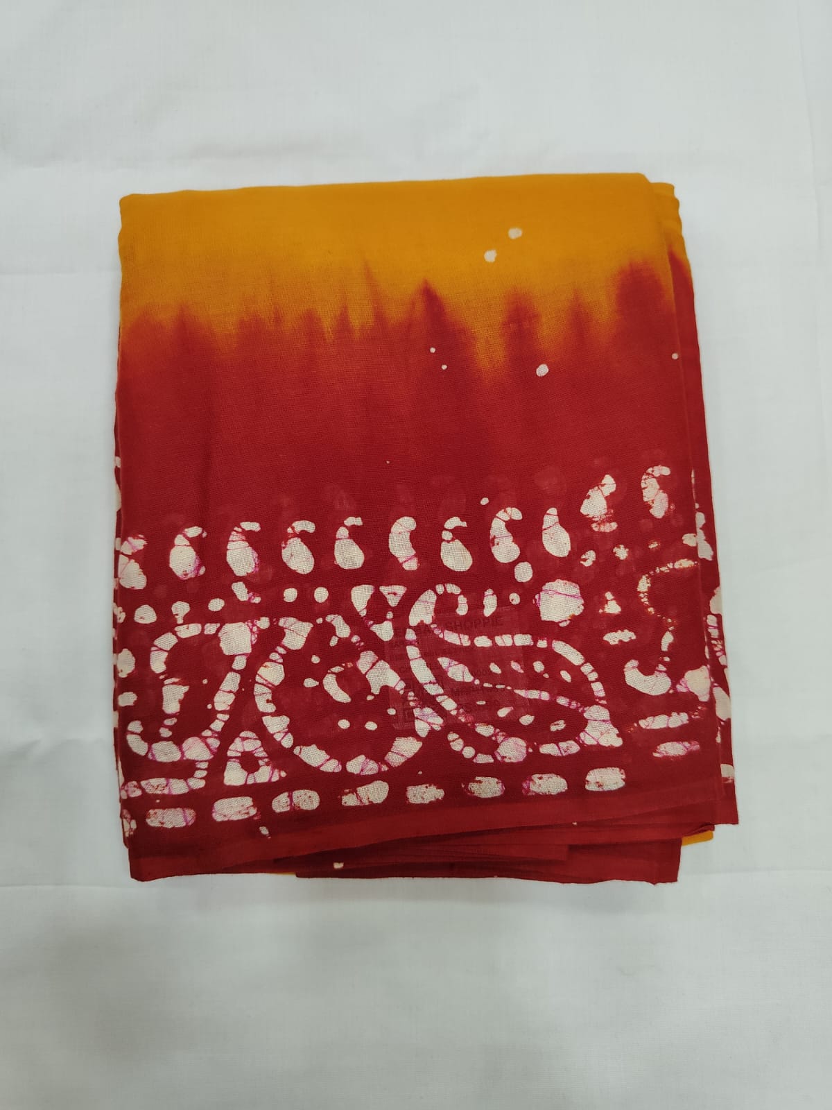 Yellow Mulmul Cotton Saree with Red Batik Print Border